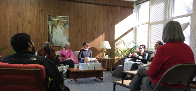 Adult group meeting in home